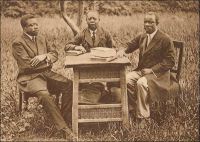 Les pasteurs J. Kuo-Isédu, J. Ekolo, J. Modi-Din. – Il s’agit de pionniers de l’église protestante camerounaise, appelés par les circonstances particulières à leur époque à assumer des responsabilités habituellement dévolues à des missionnaires occidentaux.  Après la défaite allemande de la première guerre mondiale, le Cameroun fut placé par la Société des Nations sous mandat britannique, dans sa partie ouest, et français, dans sa partie est. La France n’autorisa pas le retour de missionnaires étrangers, et leurs stations furent confiées à la Société des missions évangéliques de Paris, qui, faute de missionnaires disponibles, s’en remis aux pasteurs locaux. Ainsi, c’est aux pasteurs Joseph Ekolo, Joseph Kuo, Jacob Modi Din, mais aussi aux pasteurs Lotin et Martin Itondo que revint la charge des  églises protestantes du Cameroun sous mandat français. Joseph Ekolo et Joseph Kuo, tous deux catéchistes, avaient été consacrés pasteurs en 1912 à Bonabéri, par le missionnaire Dinkelacker. Jacob Modi Din fut consacré la même année à Bonadouma par le missionnaire Lutz, et commença à exercer son ministère dans la région de Douala. Résistant aux avances des autorités allemandes, qui voulaient exploiter la forte influence qu’il avait acquise dans la région, il fut emprisonné dès le début de la guerre.  Le premier pasteur évangélique camerounais avait été Johannes Man Eleme Deibol, consacré en 1901 par la mission de Bâle, et mort en 1908. Source : Messina, J-P. et Van Slageren, J., Histoire du Christianisme au Cameroun – Des origines à nos jours, Paris, Karthala, 2005.